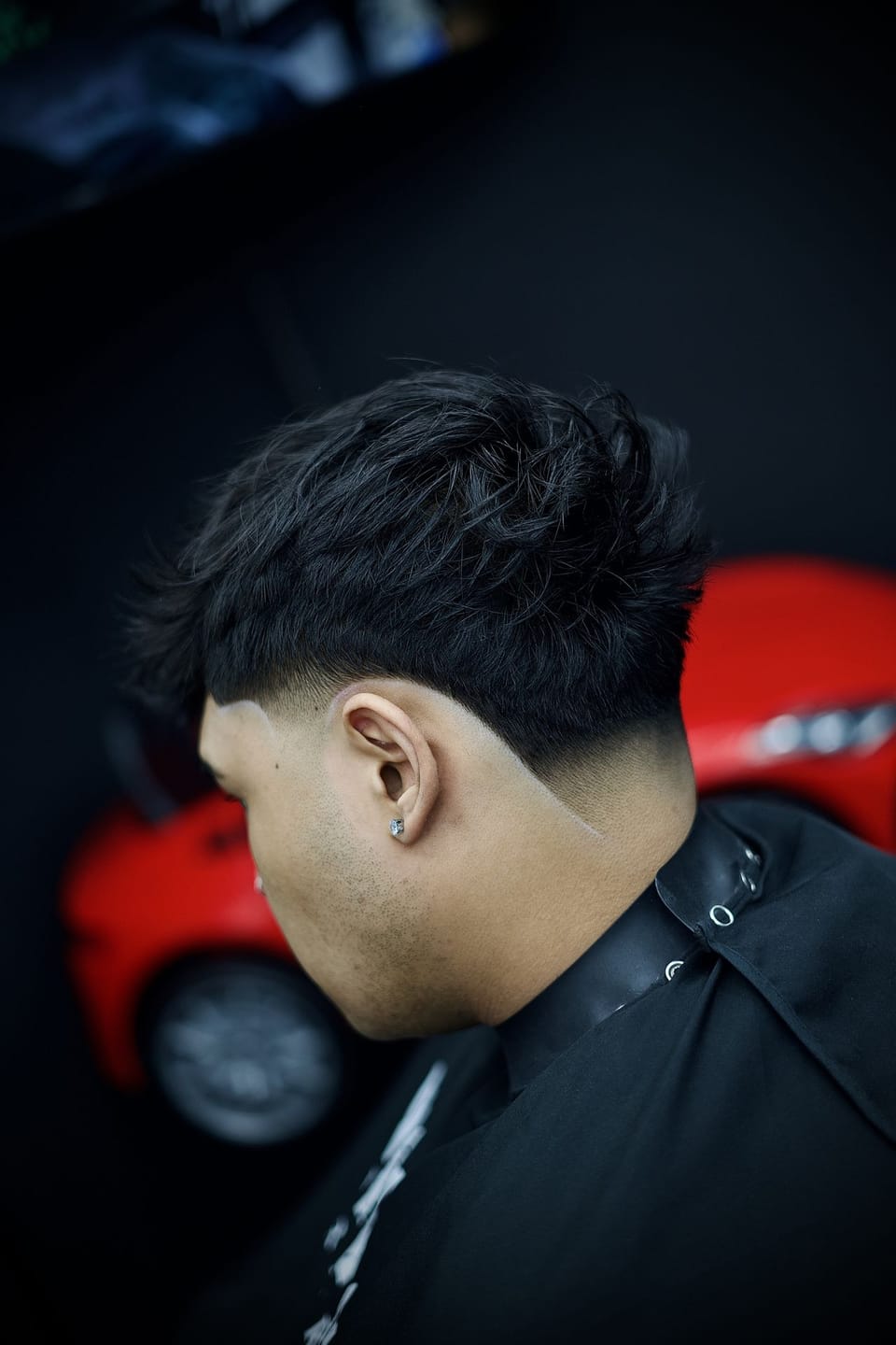 Barra de productos y ambiente de una barbería Why Not